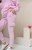 SPODNIE-DRESOWE-LEMONADA-Z-KIESZENIAMI-BABY-PINK-Model-Spodnie-lemonada.jpg